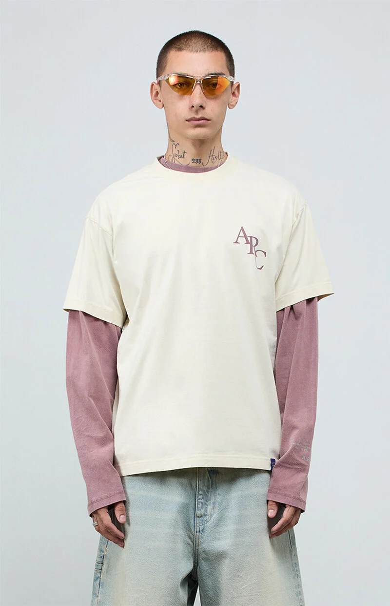 Man wearing A.R.C. Optimum light gray vintage wash heavyweight oversized T-shirt with relaxed streetwear outfit styling